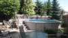 Relax on the back deck overlooking your pool !